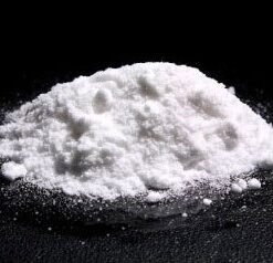 AM-2201 synthetic cannabinoid displayed on table